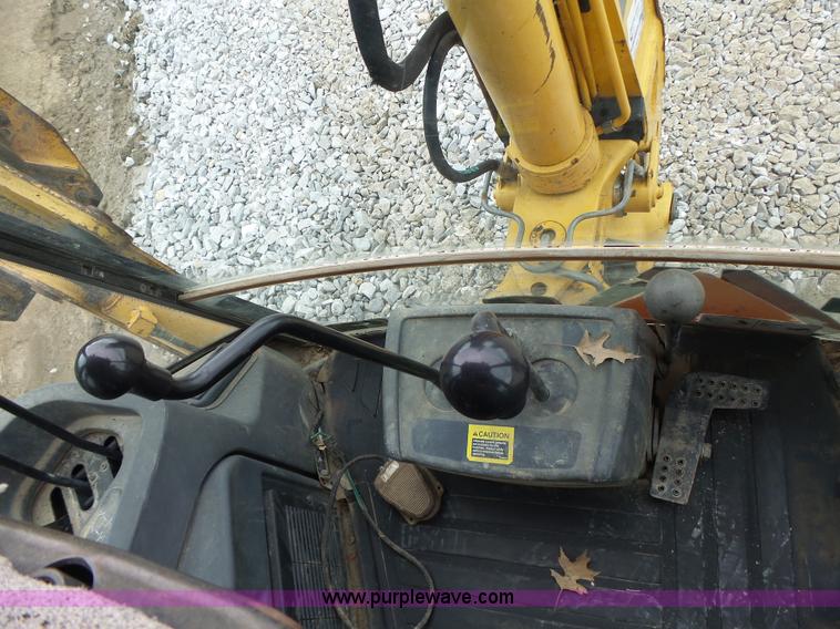 image for item L6054 2004 John Deere 310 SG backhoe