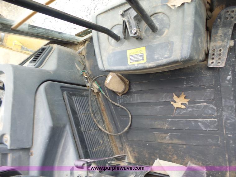 image for item L6054 2004 John Deere 310 SG backhoe