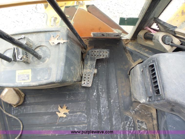 image for item L6054 2004 John Deere 310 SG backhoe