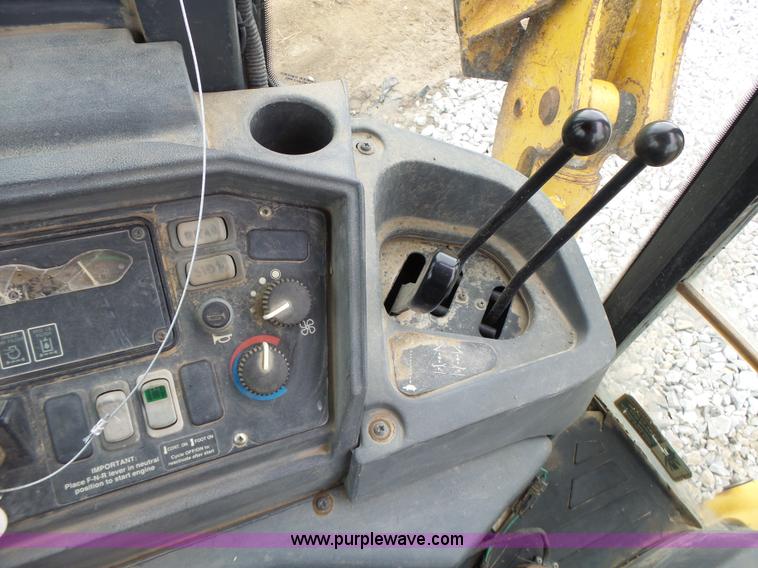 image for item L6054 2004 John Deere 310 SG backhoe