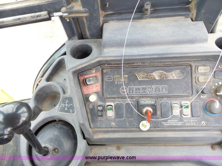 image for item L6054 2004 John Deere 310 SG backhoe