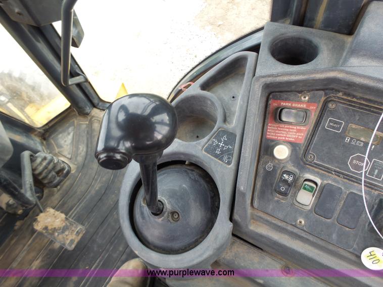 image for item L6054 2004 John Deere 310 SG backhoe