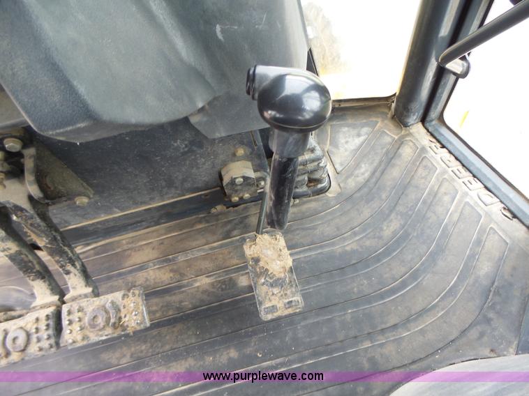 image for item L6054 2004 John Deere 310 SG backhoe