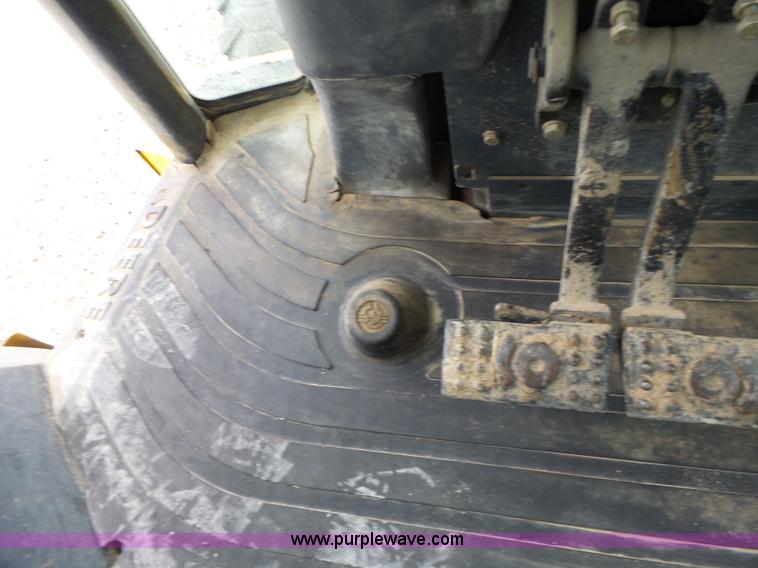 image for item L6054 2004 John Deere 310 SG backhoe