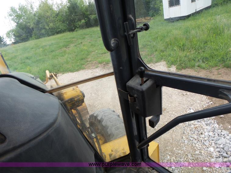 image for item L6054 2004 John Deere 310 SG backhoe