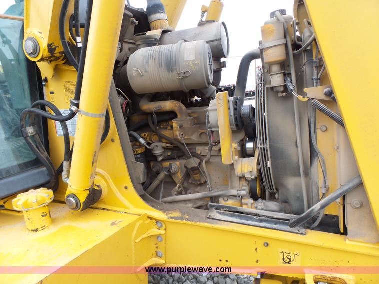 image for item L6054 2004 John Deere 310 SG backhoe