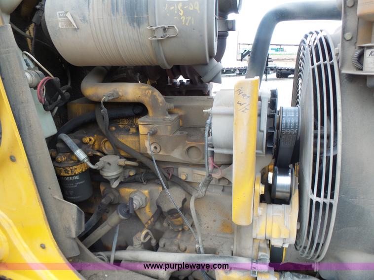 image for item L6054 2004 John Deere 310 SG backhoe