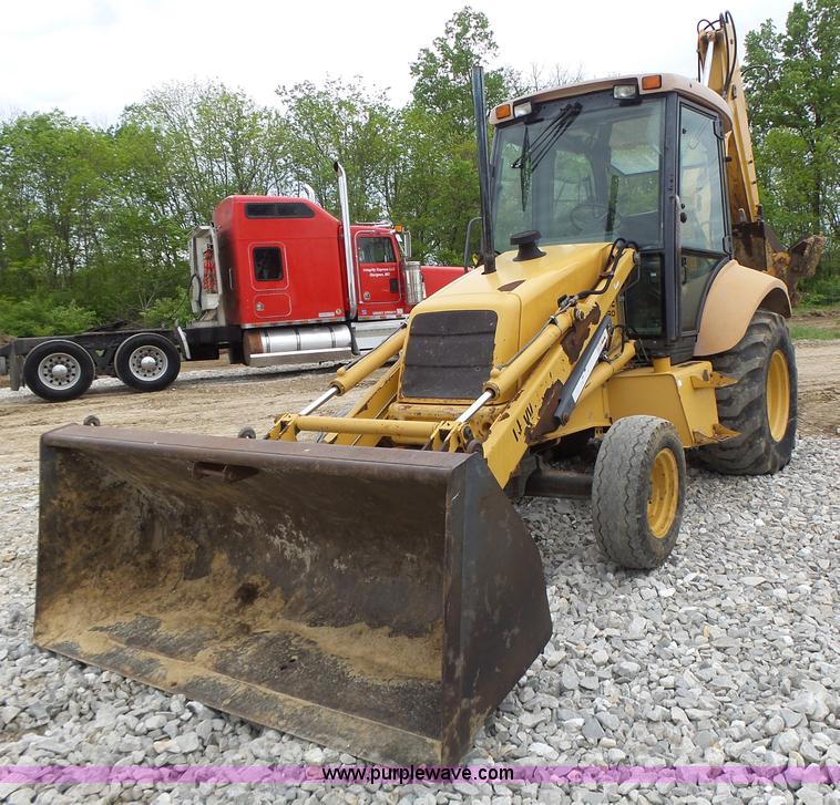 image for item L6055 Ford 555 backhoe