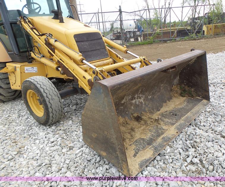image for item L6055 Ford 555 backhoe