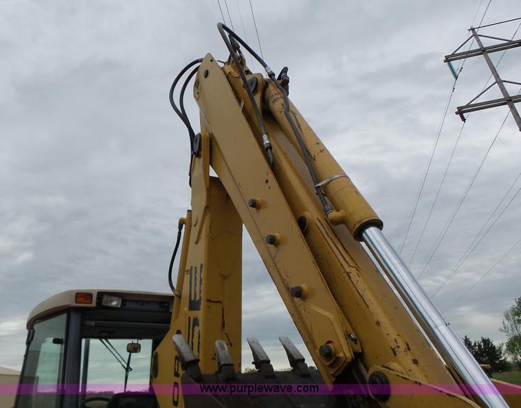 image for item L6055 Ford 555 backhoe