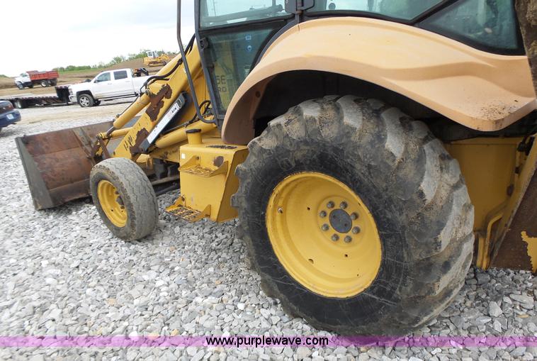 image for item L6055 Ford 555 backhoe