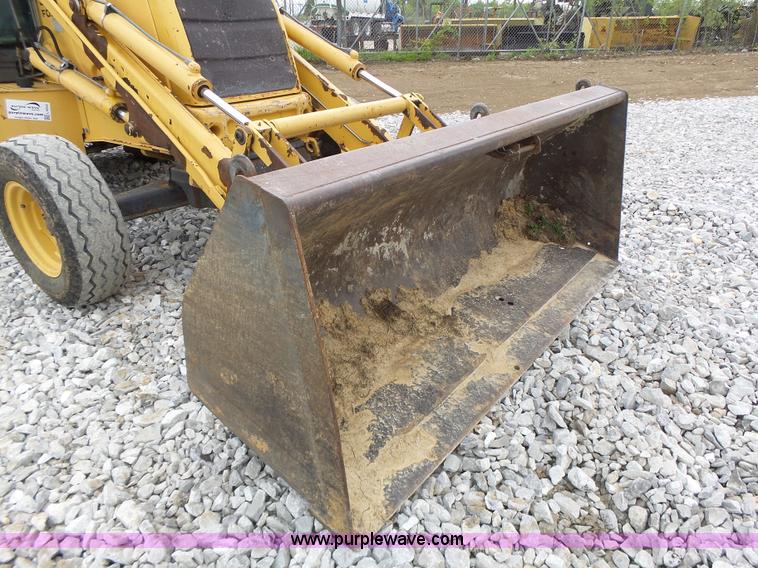 image for item L6055 Ford 555 backhoe