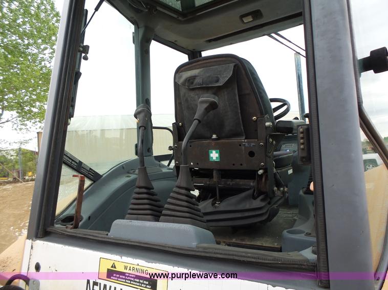 image for item L6055 Ford 555 backhoe