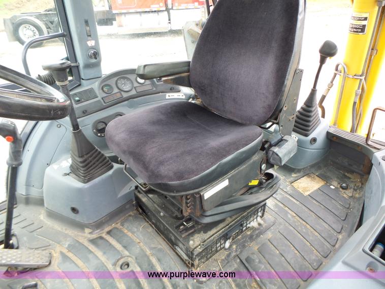 image for item L6055 Ford 555 backhoe