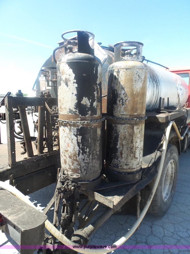 image for item L6332 1994 Freightliner FL70 oil distributor truck