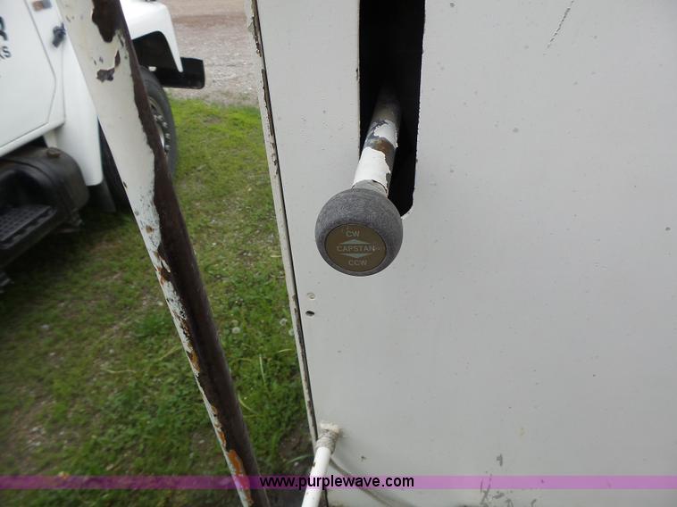 image for item L7233 1983 Ford C8000 digger derrick truck