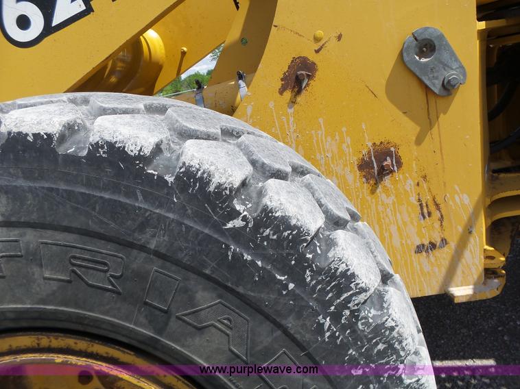 image for item L7236 1999 John Deere 624H wheel loader