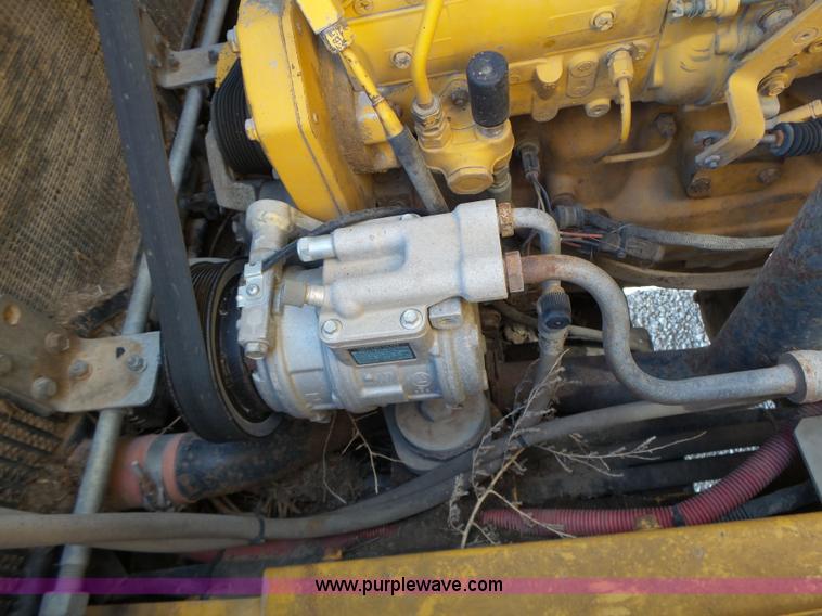 image for item L7236 1999 John Deere 624H wheel loader