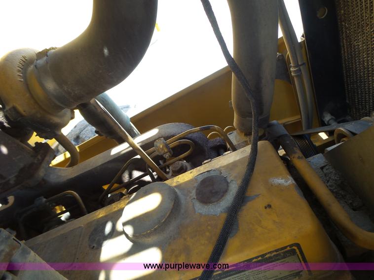 image for item L7236 1999 John Deere 624H wheel loader