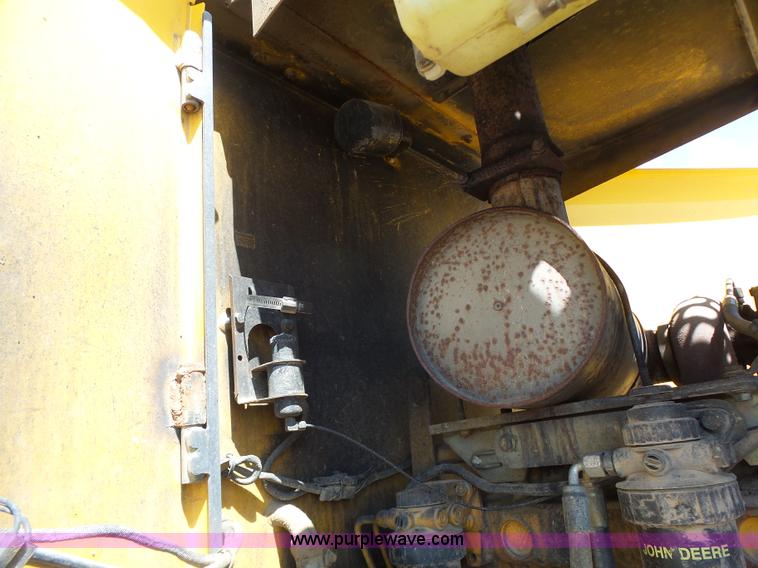 image for item L7236 1999 John Deere 624H wheel loader