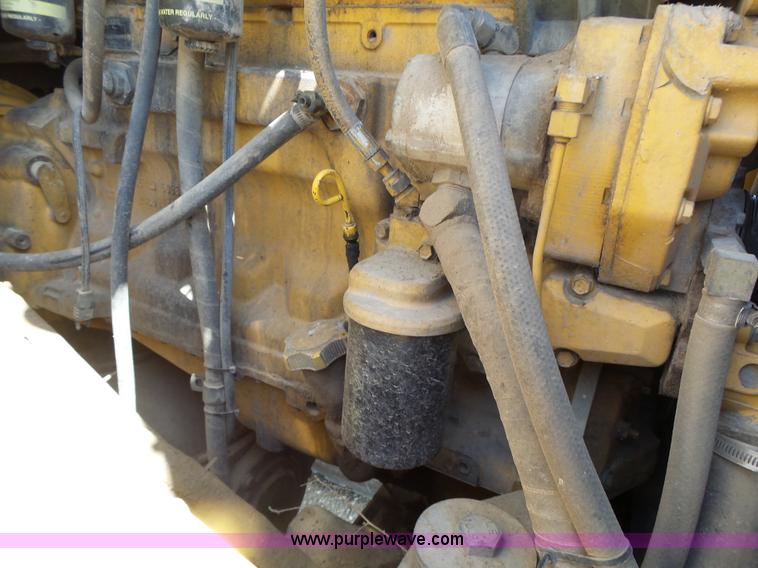 image for item L7236 1999 John Deere 624H wheel loader