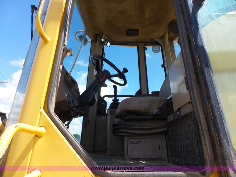 image for item L7236 1999 John Deere 624H wheel loader