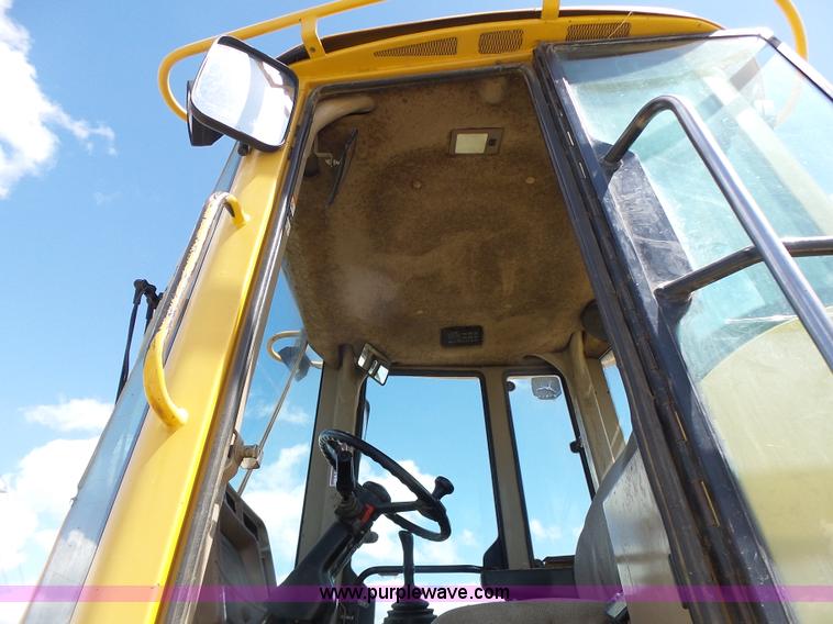 image for item L7236 1999 John Deere 624H wheel loader