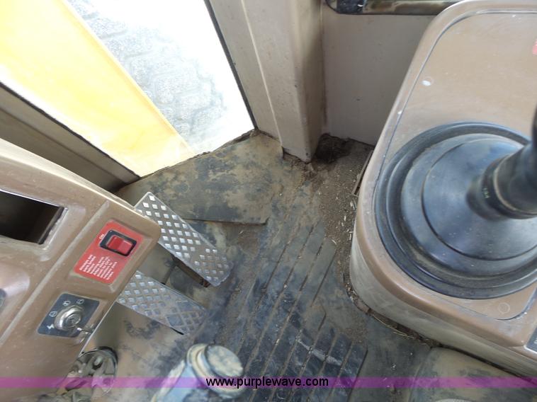 image for item L7236 1999 John Deere 624H wheel loader