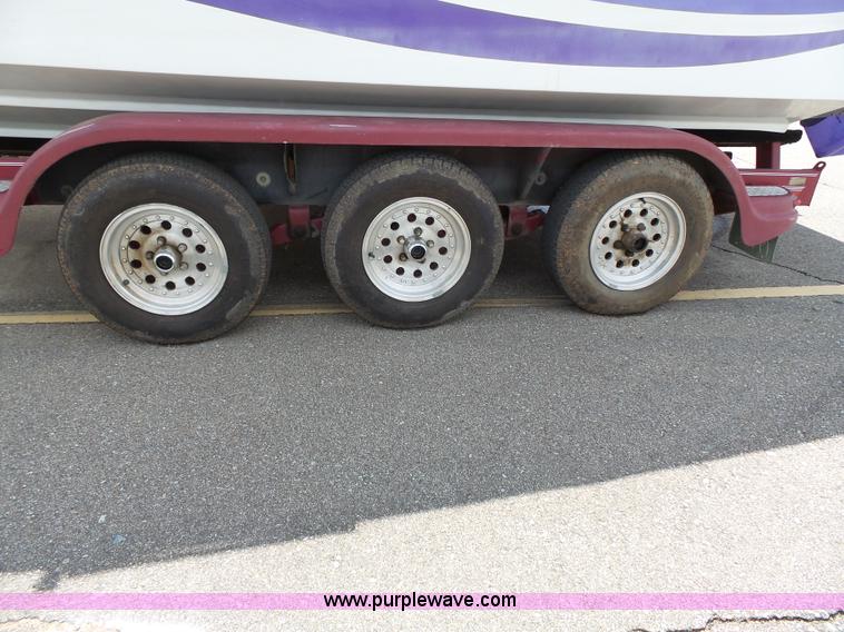 image for item J4970 1995 Baja 320 OS 32' boat and trailer