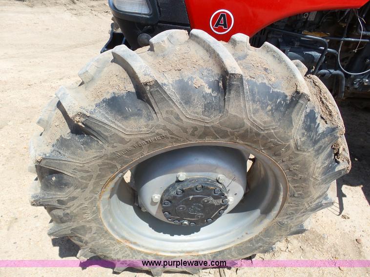 image for item J6140 Case IH 75A MFWD tractor