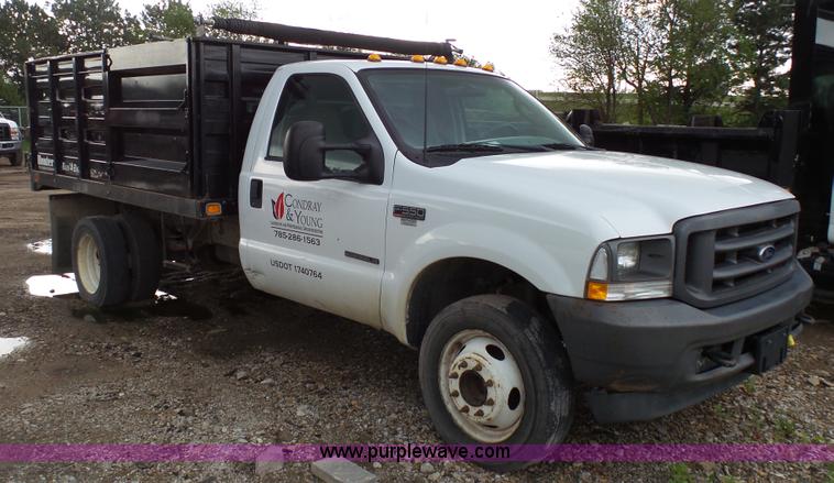 image for item K4171 2003 Ford F550 Super Duty flatbed dump pickup truck