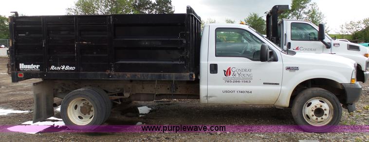 image for item K4171 2003 Ford F550 Super Duty flatbed dump pickup truck