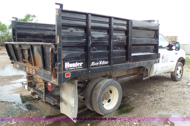 image for item K4171 2003 Ford F550 Super Duty flatbed dump pickup truck