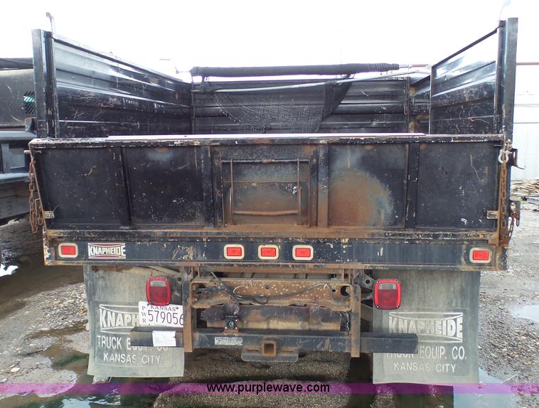 image for item K4171 2003 Ford F550 Super Duty flatbed dump pickup truck