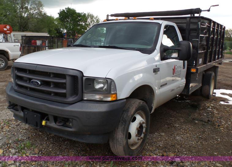 image for item K4171 2003 Ford F550 Super Duty flatbed dump pickup truck