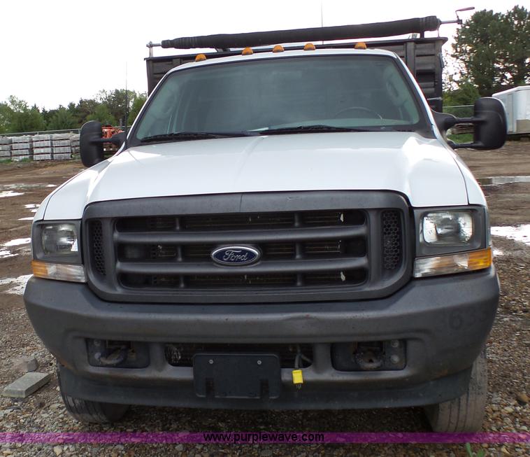 image for item K4171 2003 Ford F550 Super Duty flatbed dump pickup truck