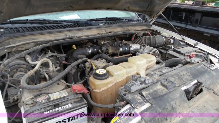 image for item K4171 2003 Ford F550 Super Duty flatbed dump pickup truck