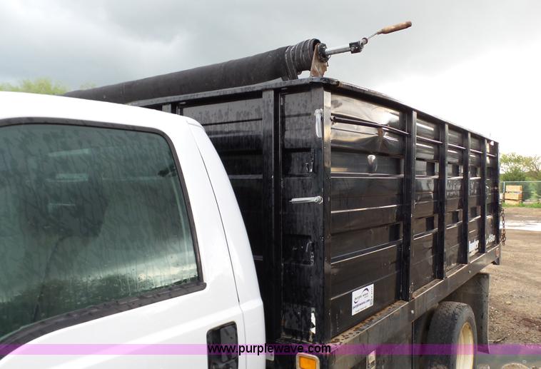 image for item K4171 2003 Ford F550 Super Duty flatbed dump pickup truck