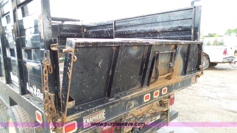 image for item K4171 2003 Ford F550 Super Duty flatbed dump pickup truck