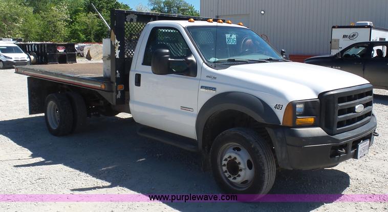 image for item K7913 2005 Ford F550 flatbed pickup truck