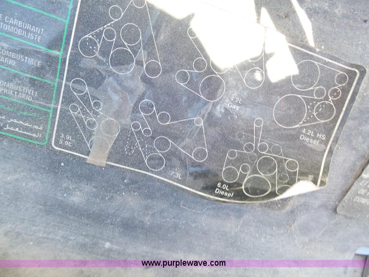 image for item K7913 2005 Ford F550 flatbed pickup truck