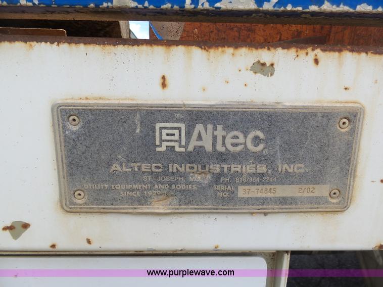 image for item K7953 2002 Chevrolet C7500 derrick digger truck