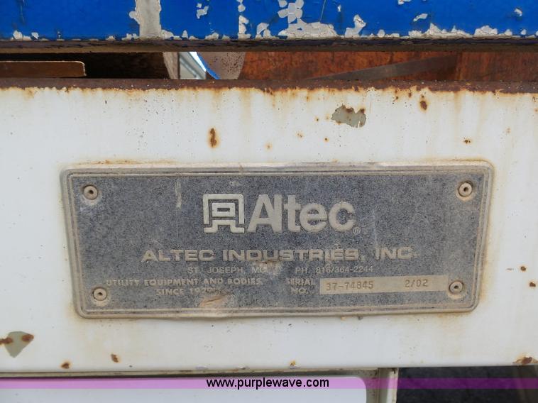 image for item K7953 2002 Chevrolet C7500 derrick digger truck