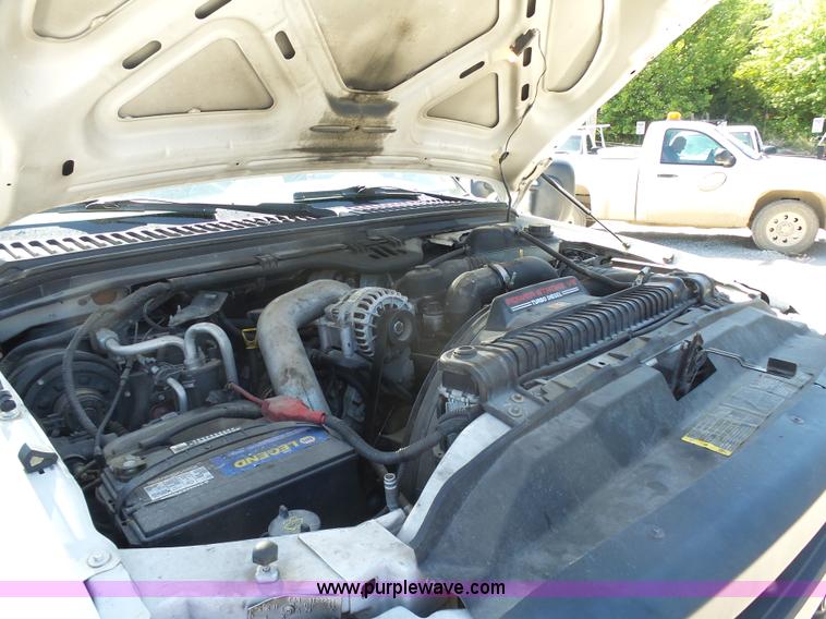 image for item L7036 2007 Ford F550 Super Duty XL flatbed pickup truck