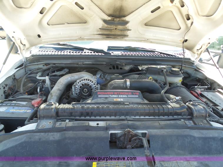 image for item L7036 2007 Ford F550 Super Duty XL flatbed pickup truck