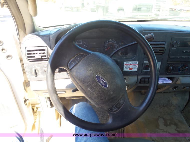 image for item L7036 2007 Ford F550 Super Duty XL flatbed pickup truck