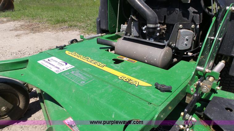 image for item K4118 2009 John Deere 667A QuikTrak lawn mower