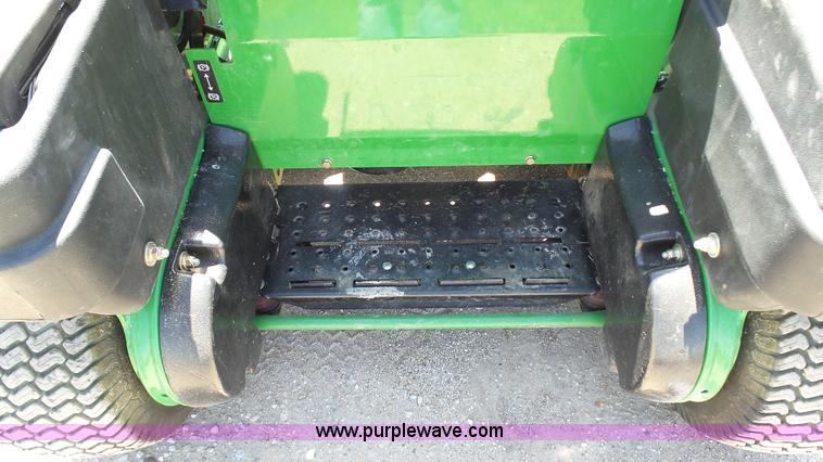 image for item K4118 2009 John Deere 667A QuikTrak lawn mower