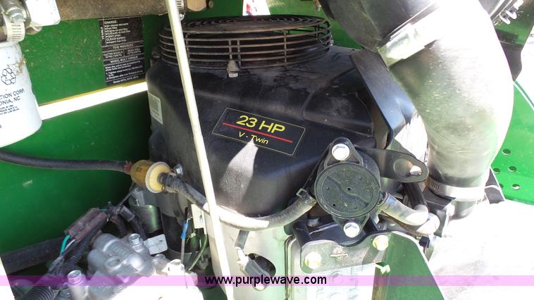 image for item K4118 2009 John Deere 667A QuikTrak lawn mower