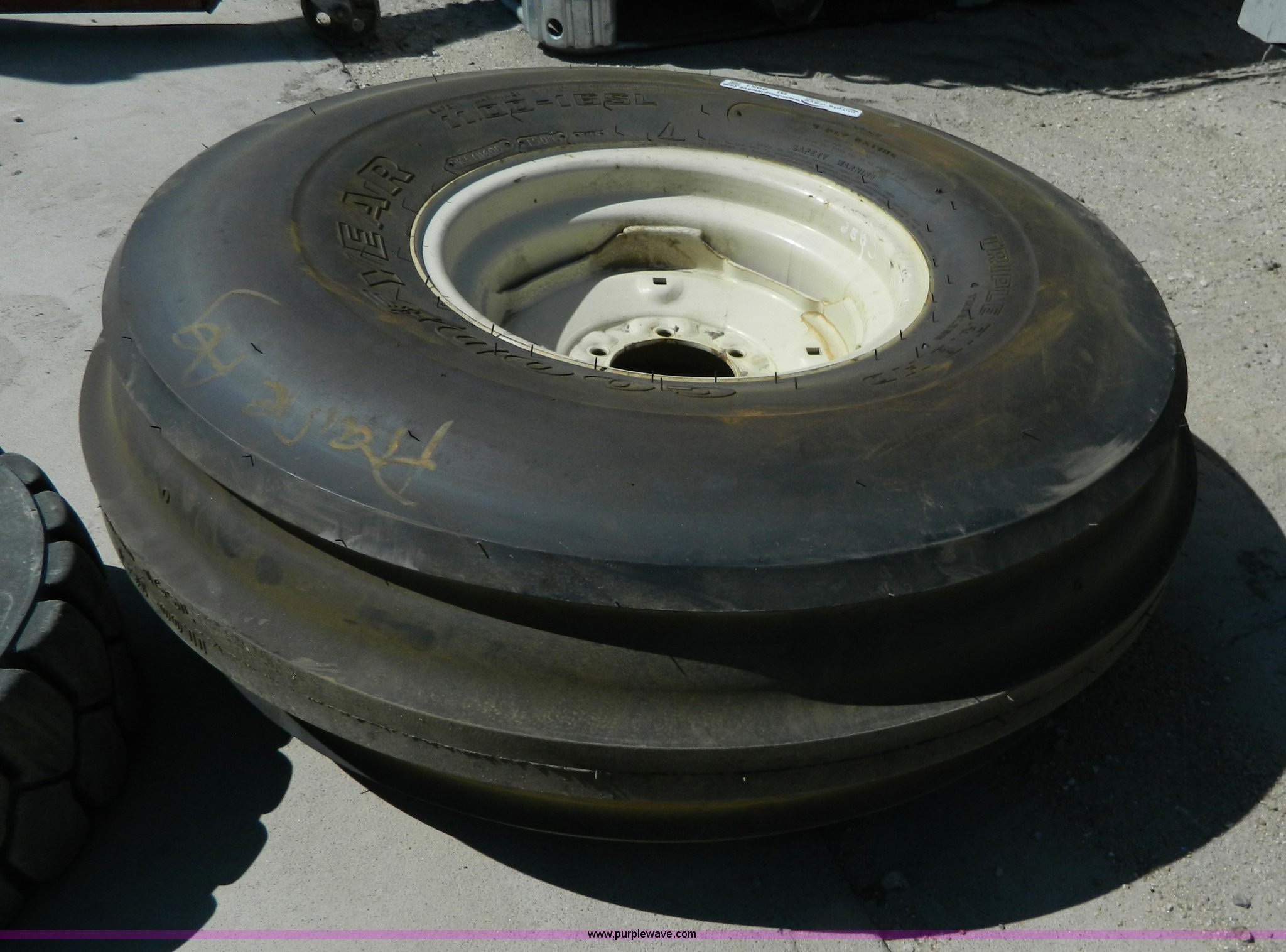 Goodyear 11.0016SL foamfilled tire and wheel in Plainville, KS Item BI9951 sold Purple Wave